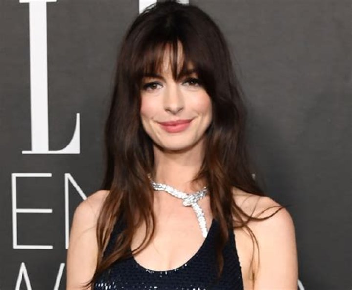 Anne Hathaway in Bathing Suit Top Says "Happy New Year" — Celebwell