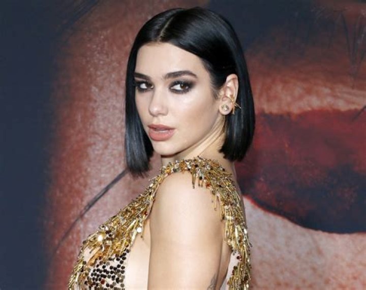Dua Lipa Shares Swimsuit Photo "Sailing Through the Peloponnese"