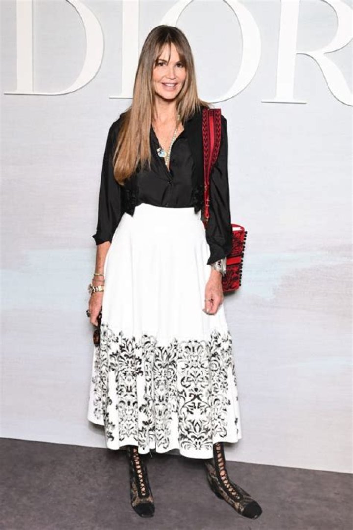 Elle Macpherson in Bathing Suit is "Stepping Up" — Celebwell