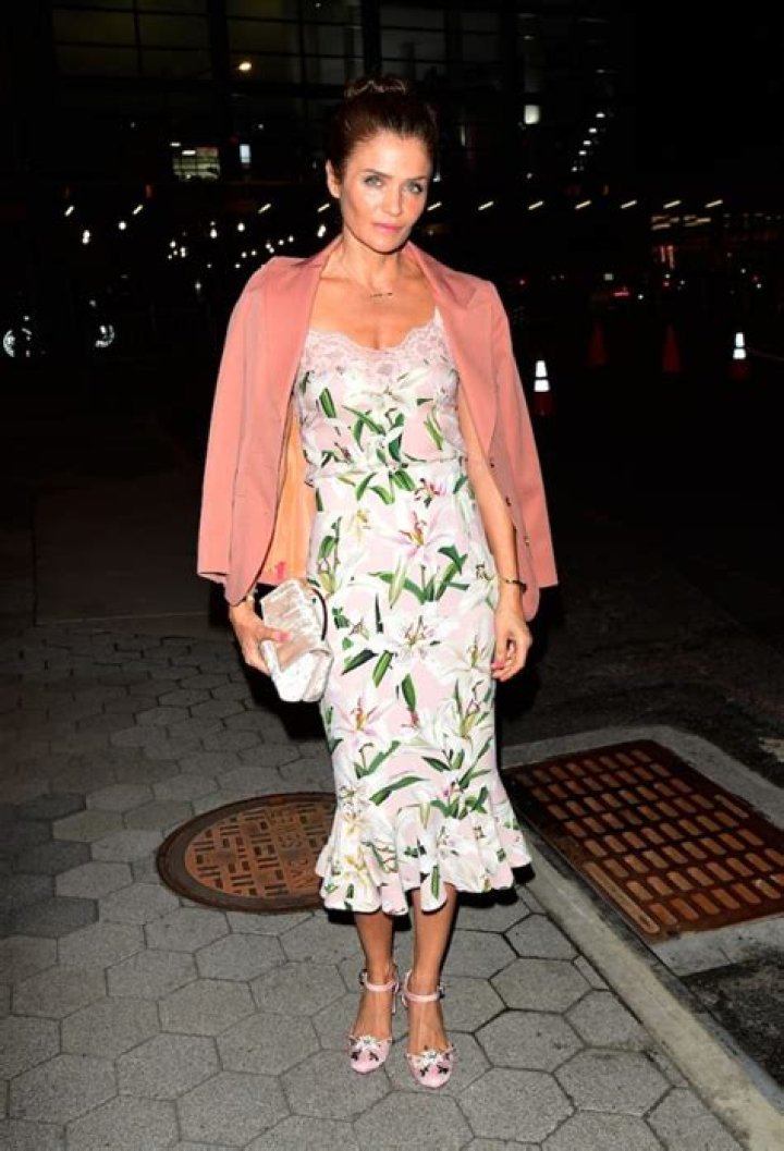 Helena Christensen in Bathing Suit Exfoliates Legs With "Coffee Grounds" — Celebwell