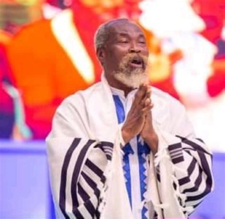 Prophet Adom Kyei Duah shares 86 billion old cedis to the needy in his church