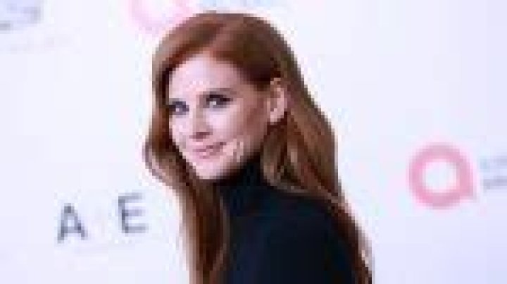 Suits Star Sarah Rafferty in Workout Gear Goes Surfing