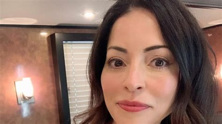 Two and a Half Men Star Emmanuelle Vaugier Shares Swimsuit Photo "Poolside" — Celebwell